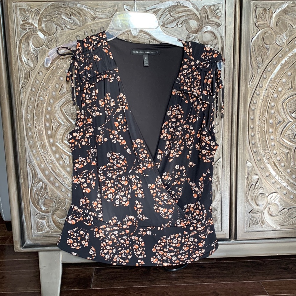 White House Black market tie sleeve crossover waistband black sleeveless shirt